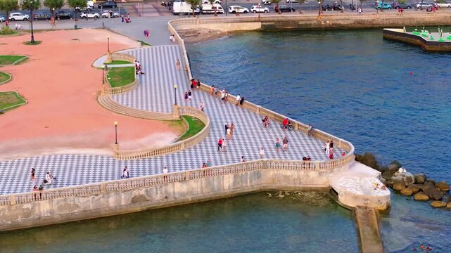traditional argyle pattern pavers at the seaside park in Livorno, Italy, romantic early evening stroll past the Gazebo Terrazza Mascagni