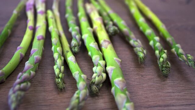 Gourmet Green Asparagus on Rustic Wood, Cinematic Slider Movement.