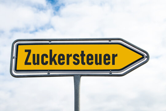 Sugar tax in german language, paying taxation on sweet food and drinks, increase price for chocolate, payment to state, financial reform in Germany