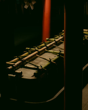 Moody shot of a traditional Japanese bamboo water basin at night