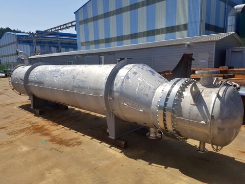 Shell and tube heat exchanger unit at industrial fabrication yard