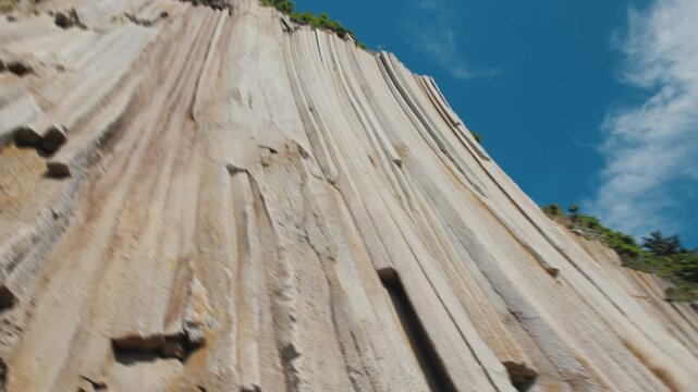 Close up view of the Cape Stolbchaty on the west shore of Kunashir Island with its unique rock formations, Kuril Islands, in Sakhalin Oblast, Russia