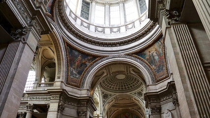 Fototapeta premium Magnificent interior of the Pantheon in Paris, showcasing the grand dome, neoclassical architecture, elegant columns, and historic details. Iconic French landmark, popular travel destination, and cult