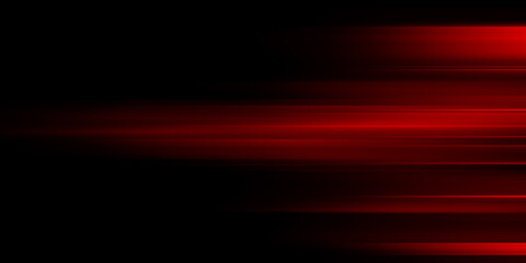 The effect of red light in fast motion on a black background. blurred abstract background with long exposure. neon light  © gojalia