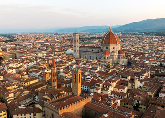 Obraz premium Aerial landscape Florence Italy historic city center. Duomo cathedral dome drone shot sunrise summer. Scenic renaissance landmark Tuscany travel destination world heritage architecture background.