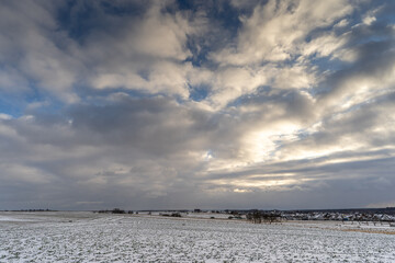 Obraz premium Snowy farmland landscape in Podkarpacie Poland winter 