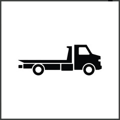 Fototapeta premium Simple black silhouette of a flatbed truck on a white background