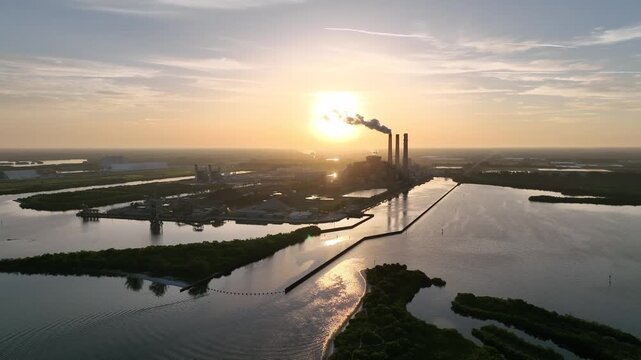 Sunset over Apollo Beach / Stacks at power plant station