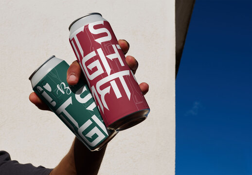 Real photo of Hand Holds Two Cans. PSD mockup.