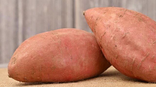 video of a raw sweet potato
