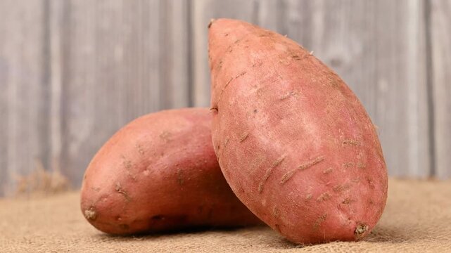 video of a raw sweet potato