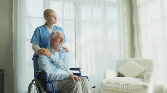 Help support retirement healthcare. Nurse helping old man in wheelchair. Patient and woman in nursing home for medical caregiver. Nurse taking care of paralyzed man in chair for people with disability