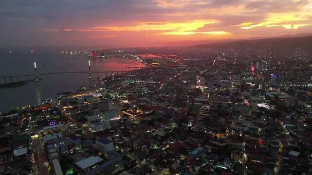Cebu City, Philippines - Aerial Sunset View with Glowing Urban City Lights