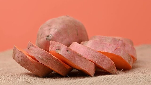 video of a raw sweet potato