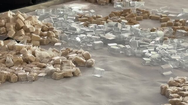 Wrapping Coconut Candy in Rice Paper