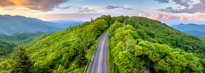 Blue Ridge Parkway road trip. Evening Appalachian mountains landscape. Driving car exploration travel in summer forest in North Carolina. Summertime landscape of beautiful nature © bilanol