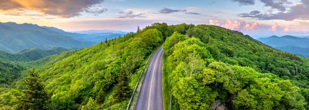 Blue Ridge Parkway road trip. Evening Appalachian mountains landscape. Driving car exploration travel in summer forest in North Carolina. Summertime landscape of beautiful nature