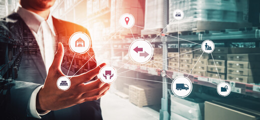 Obraz premium Smart warehouse management system with innovative internet of things technology to identify package picking and delivery . Future concept of supply chain and logistic network business .