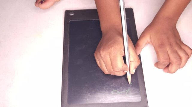 Hand Writing on Digital Slate Tablet with Stylus Pen, Online Learning and E Learning Concept, Digital Note Taking, Modern Education Technology, Close Up Writing Screen 4K Footage
