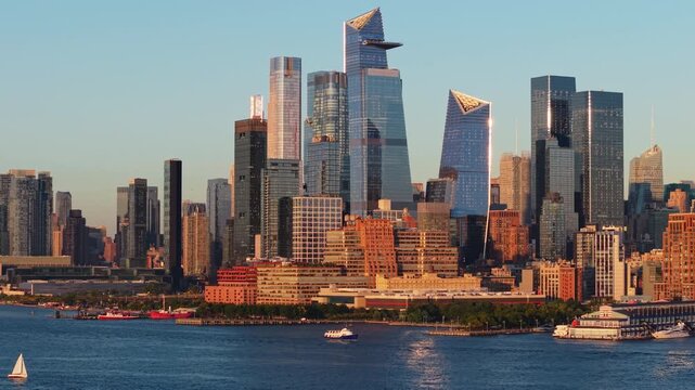 Aerial view of New York City skyline featuring Hudson Yards and landmark skyscrapers along the Hudson River. Summer in Midtown Manhattan 