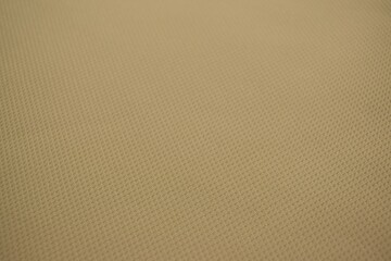Fototapeta premium Texture of non-woven fabric. Brown background