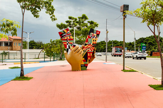 Sculpture of hands playing a pair of colorful rattles in the Pra&ccedil;a do Foguete (Rocket Square), in the Renascen&ccedil;a neighborhood, S&atilde;o Lu&iacute;s, Maranh&atilde;o state, Brazil.
