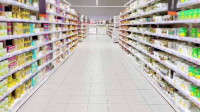 choosing a dairy products at supermarket.various goods on the supermarket shelves