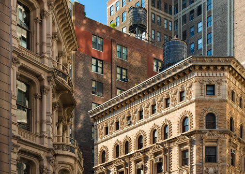 New York City, Flatiron District, Manhattan. Architectural detail featuring ornate building facades and rooftop water towers along Broadway