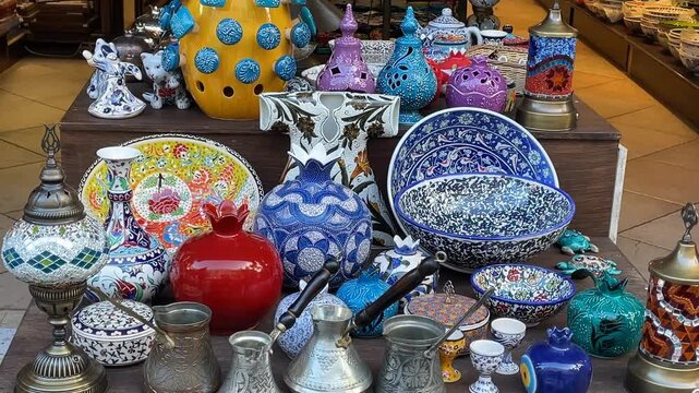 Colorful Turkish ceramic pottery displayed in front of shop