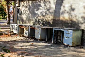 Naklejka premium broken office furniture in outdoors, rubble waste debris from new improvements move in cleaning services.