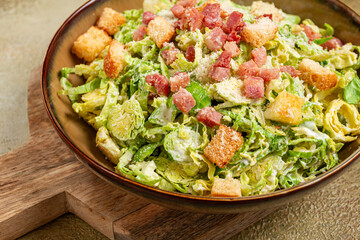 Brussels sprouts Caesar salad, with bacon and croutons, healthy food, homemade, no people,