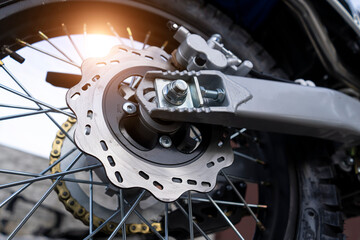 motorcycle rear wheel with brake disc close-up © Polivan