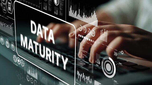 Conceptual illustration of data maturity with digital graphics and hands typing on a keyboard in a modern workspace. Asymptotic smart data analytic.