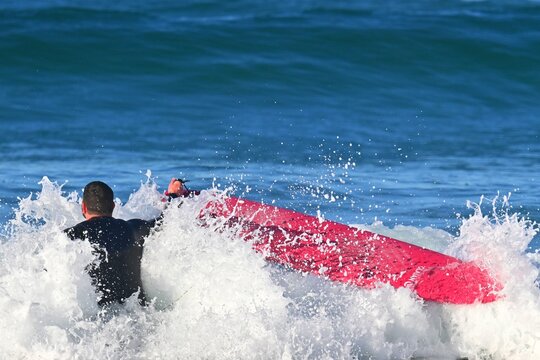 A dynamic moment captured off the coast of Ferrol, Spain, where an experienced surfer rides a powerful ocean wave.December 27, 2025