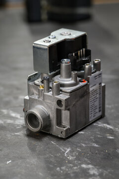 A replacement electromagnetic valve for the gas supply of a burner.