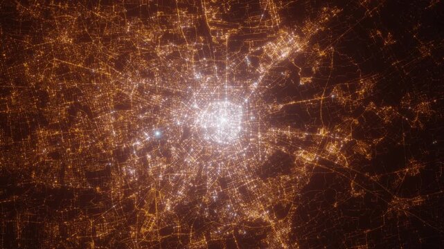 Milan (Italy) top view at night. Aerial view on modern city with lights. Camera is flying above the city, moving backward. Vertical video. The north is on the left side