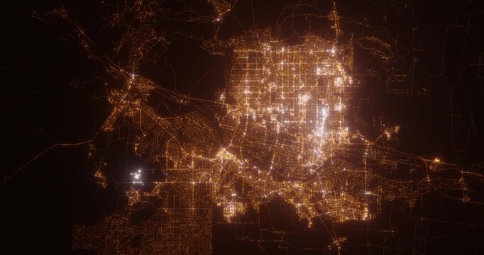 Albuquerque (New Mexico, USA) top view at night. Aerial view on modern city with lights. Camera is flying above the city, moving backward. Vertical video. The north is on the left side