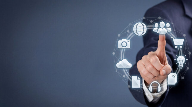 Businessman finger touches glowing digital network interface representing connectivity and various online application services