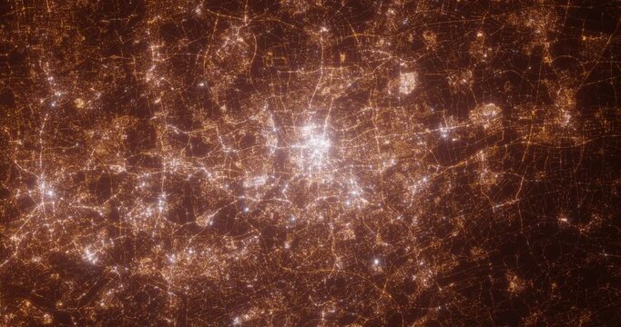 Dortmund (Germany) aerial view at night. Top view on modern city with street lights. Camera is zooming out, rotating clockwise