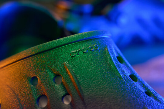 Tyumen, Russia-February 15, 2026: crocs shoes focused on Echo Clog style in unique lighting setup at a local store display