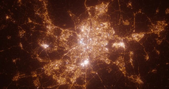 Madrid (Spain) aerial view at night. Top view on modern city with street lights. Camera is zooming out, rotating clockwise