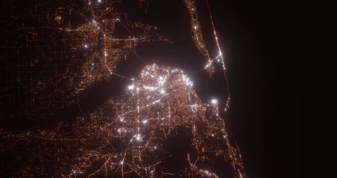 Pensacola (Florida, USA) aerial view at night. Top view on modern city with street lights. Camera is zooming out, rotating counterclockwise. Vertical video. The north is on the left side