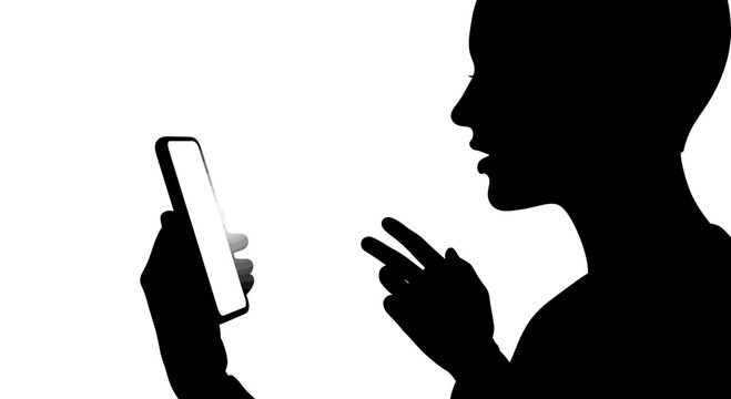 Silhouette of a person video calling on a smartphone