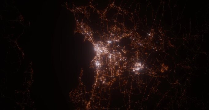 Burlington (Vermont, USA) aerial view at night. Top view on city from space. Camera is zooming in, rotating clockwise