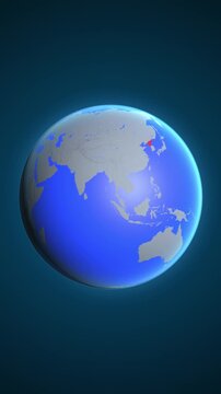 The animation shows a graphic representation of the earth and highlights the location and map of North Korea colored red in vertical format.
