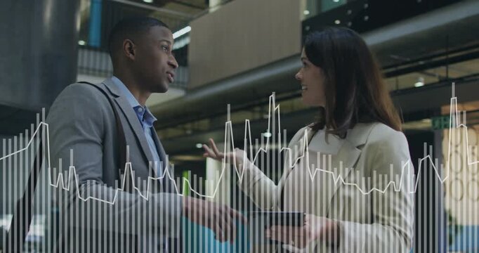 Man initiating gesture, woman adjusting tablet, discussing project, waveform rising with gestures
