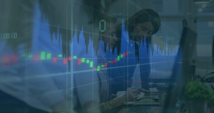 Standing pro pointing while seated typing, chart overlay appearing and driving finance move