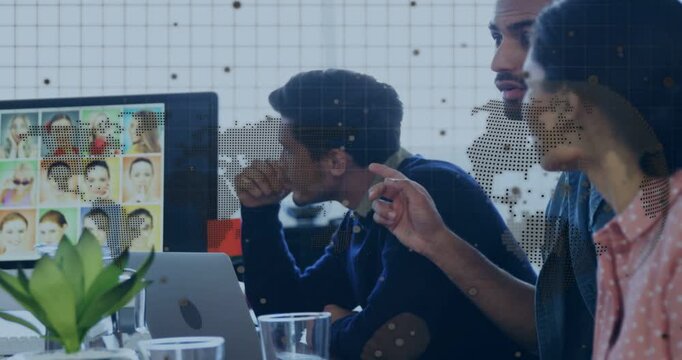 Vertical video: Team pointing faces on screen driving hiring review map overlaying wall behind team