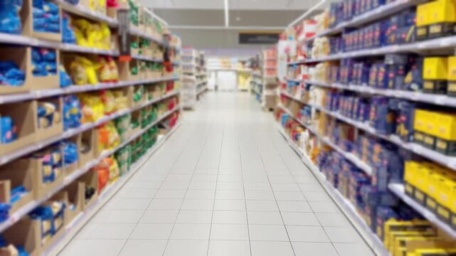 choosing a dairy products at supermarket.various goods on the supermarket shelves