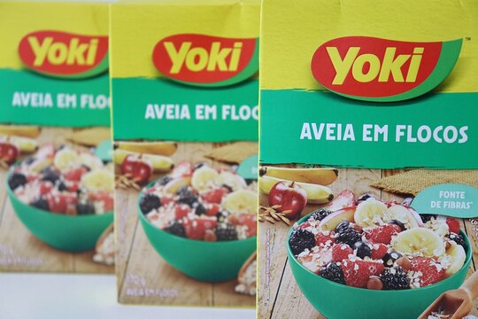 Salvador, Brazil - March 20, 2026: Packaging of Yoki brand Aveia em Flocos (rolled oats). Brazilian Yoki logo.